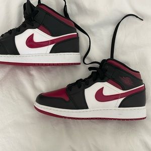 Nike Air Jordan Mid, worn once, a size 6.5 in youth, and is in perfect condition